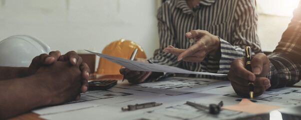 Engineer Teamwork Meeting, Drawing working on blueprint meeting for project working with partner on model building and engineering tools in working site, Construction and structure concept.