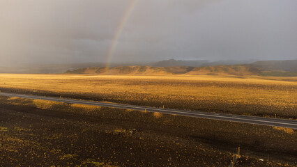 Rainbow over the road - Iceland