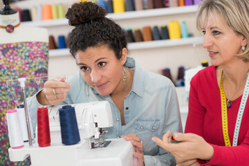 portrait of women during sewing process