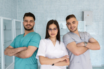 Group of medical staff smiling at the hospital.