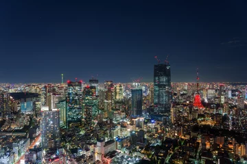 Fotobehang Tokyo, Japan - November 2022: Panoramic view of Tokyo skyscrapers and Tokyo tower with special illumination for full moon night. © hit1912