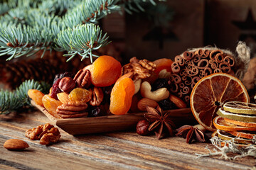 Christmas still-life with dried fruits and nuts.