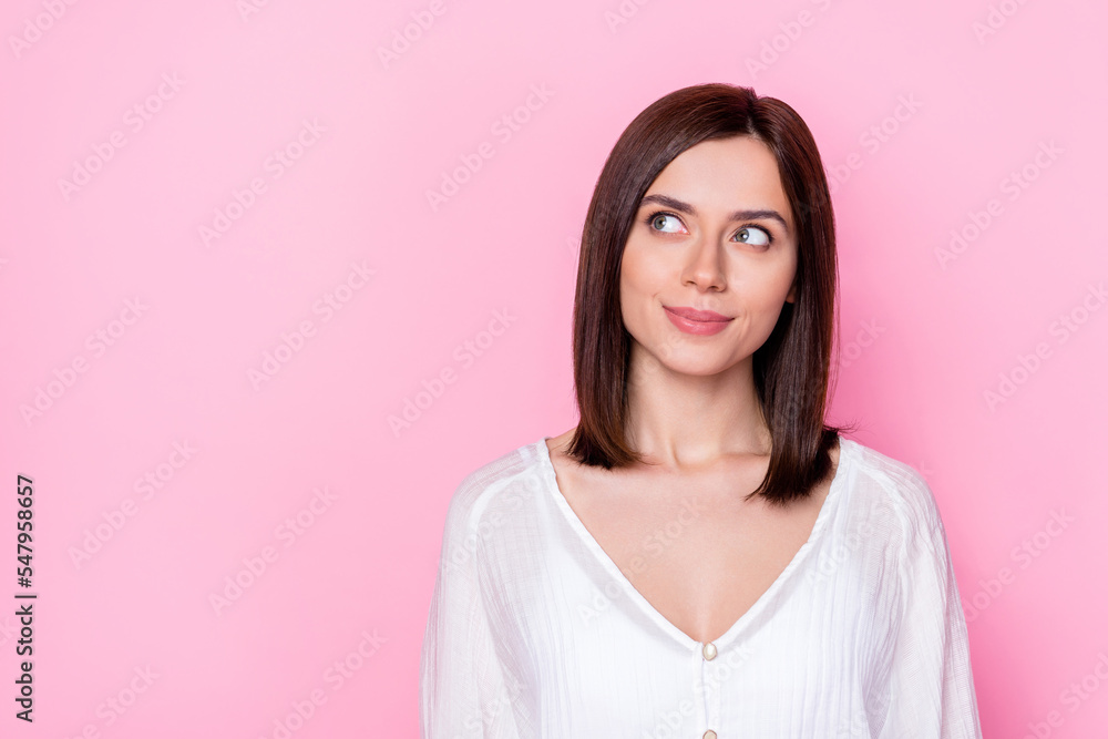 Sticker Photo portrait of stunning young girl look curious empty shopping space wear trendy white garment isolated on pink color background