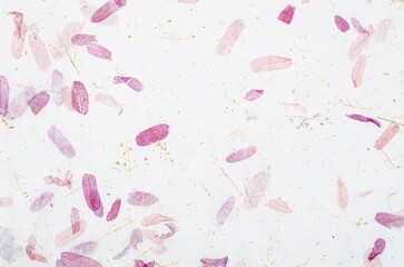 The Recycled flower and leaf paper or mulberry paper texture as background.