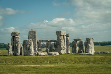 Fototapeta na wymiar Moody Stonehenge photo with cloudy sky. Salisbury, UK.