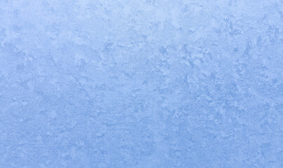 Beautiful frosty pattern on the window. Ice pattern. Banner. Selective focus.