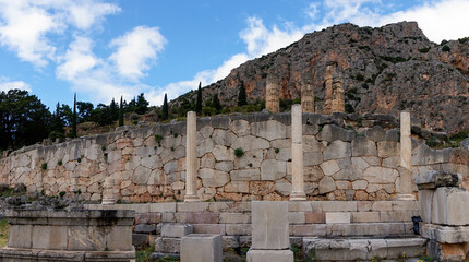 view of Doric columns and temple ruins in the Sanctuary Athena Pronaia in Delphi