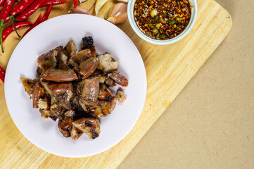 Grilled pork intestine with chilli sauce spicy, Roasted pork Chitterlings with chilli sauce spicy,...