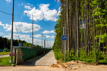 Remaining forest and urban clearing for road and footpath