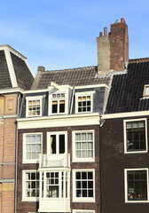 Fototapeta na wymiar Amsterdam Prinsengracht House Facade Close Up with Chimneys, Netherlands