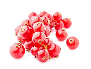 Ripe fresh  red currant berries photographed closeup isolated on a white background. Bunch of berries.