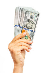 Young caucasian man holding new dollar bills up isolated on white background. American cash, money in hand