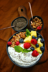 Breakfast bowl with chia yogurt, berries and fruits. Healthy snack or dessert.