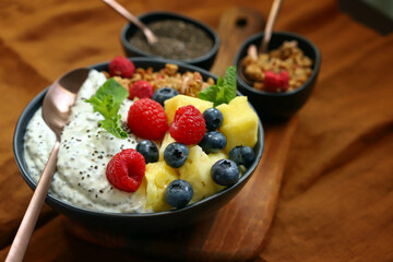 Breakfast bowl with chia yogurt, berries and fruits. Healthy snack or dessert.