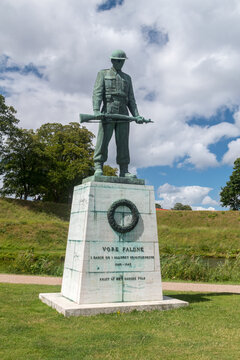 Copenhagen, Denmark - July 26, 2022: Vore faldne (English: Our fallen) is a six-metre bronze monument, by Sven Linhart.