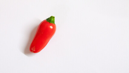 london, united kingdom, october 22, 2022: many vibrant colors on peppers on white background
