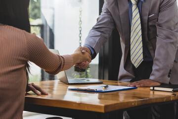 Job search and job interview, female candidate is a new employee of the company being interviewed about her resume and work experience.