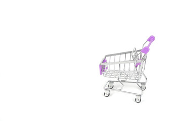 Shopping cart on white background with copy space