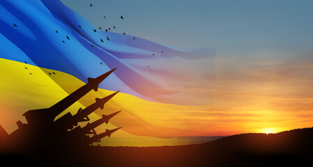 The missiles are aimed at the sky at sunset with Ukrainian flag. Nuclear bomb, chemical weapons,...
