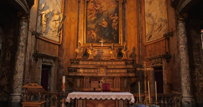Shot of statues and columns inside the church of Saint Camillus de Lellis church in Rome, Italy at daytime.
