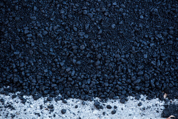 bluish-black asphalt on the ground outdoors