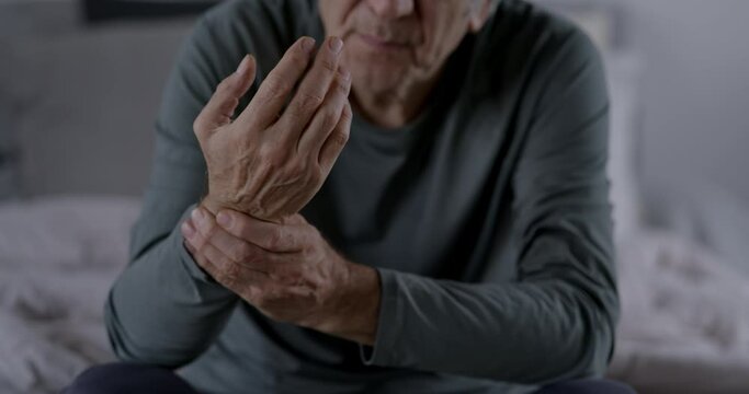 Old man suffering from pain and rheumatism