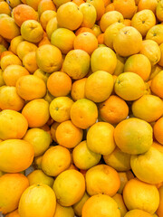 Group of oranges in the supermarket, oranges on the table