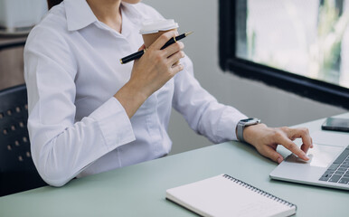 Business team present. professional investor working new start up project. Finance managers meeting.Digital tablet docking screen computer design smart phone using, in morning light