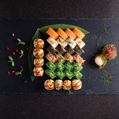 tasty sushi on the black background
