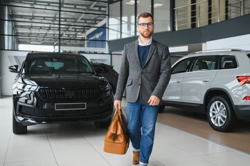 Man minded customer male buyer client in suit choose auto to go look aside want buy new automobile in car showroom vehicle salon dealership store motor show indoor Sales concept