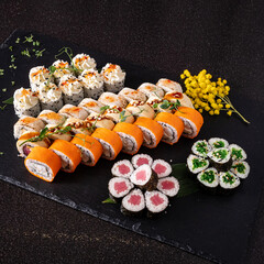 tasty sushi on the black background