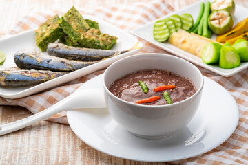 Shrimp Paste Chilli Sauce (Nam Prik Kapi) served with Fried Egg with Climbing Wattle, fried mackerel fish and boiled vegetable