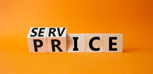 Obraz premium Service and price symbol. Turned wooden cubes with words service and price. Beautiful orange background. Business and service and price concept. Copy space