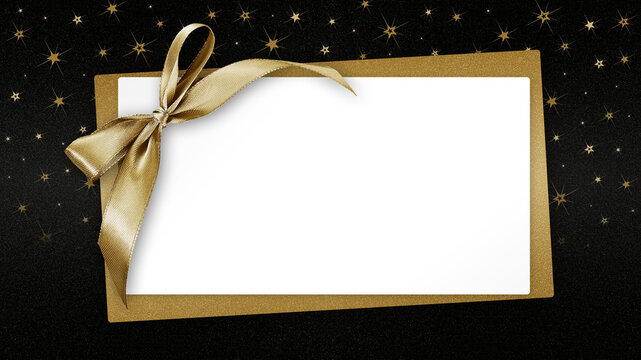 Christmas Blank gift greeting card ticket with shiny golden ribbon bow, isolated on black background with sparkle stars, top view white copy space template for promotion shopping advertising banner