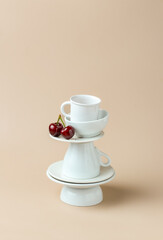 pyramid of white tableware. Teacup Tower
