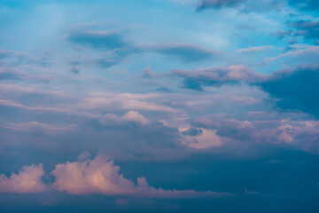 Obraz premium Colorful cloudscape during sunset or sunrise. Dusk or dawn dramatic sky with clouds