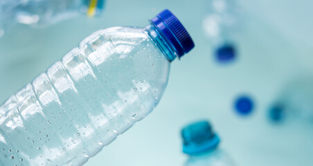 Some plastic bottles on blue background