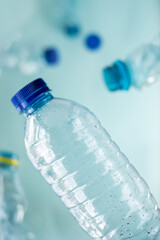 Some plastic bottles on blue background