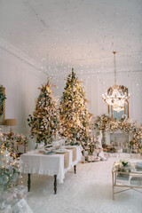Cozy atmosphere of Christmas, holidays and New Year in the details of the interior of the Christmas room. Christmas decorations luxury