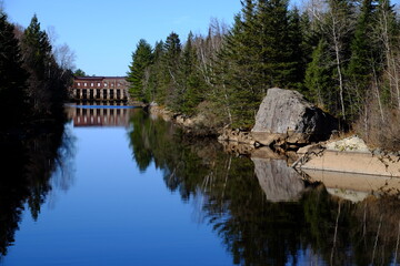 hydro electric dam in the woods