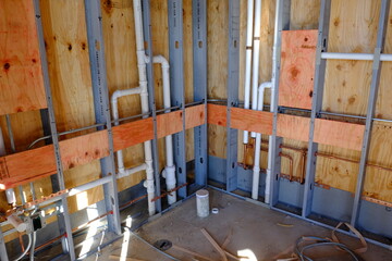 framing with in wall plumbing and fire resistant blocking
