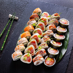 tasty sushi on the black background