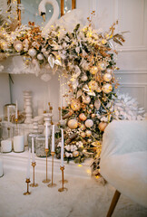 Cozy atmosphere of Christmas, holidays and New Year in the details of the interior of the Christmas room. Christmas decorations luxury