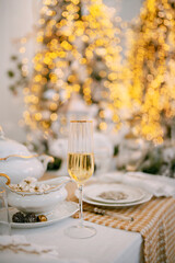 Cozy atmosphere of Christmas, holidays and New Year in the details of the interior of the Christmas room. Christmas decorations luxury