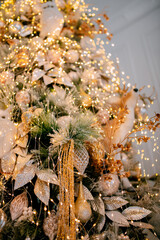 Cozy atmosphere of Christmas, holidays and New Year in the details of the interior of the Christmas room. Christmas decorations luxury