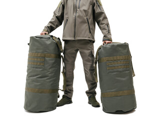Man holds custom unbranded military duffle bags on white background isolated