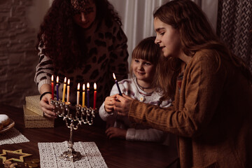 family celebration of the Jewish holiday Hanukkah at home