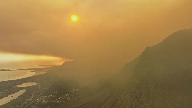 Aerial view of wildfires causing haze at Betty's Bay, near Cape Town in South Africa