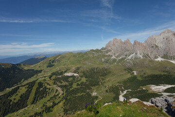 Fototapeta na wymiar wide view of an alpine valley among the Dolomites in Val Gardena
