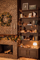 Homemade Christmas interior in brown. Living room with fireplace